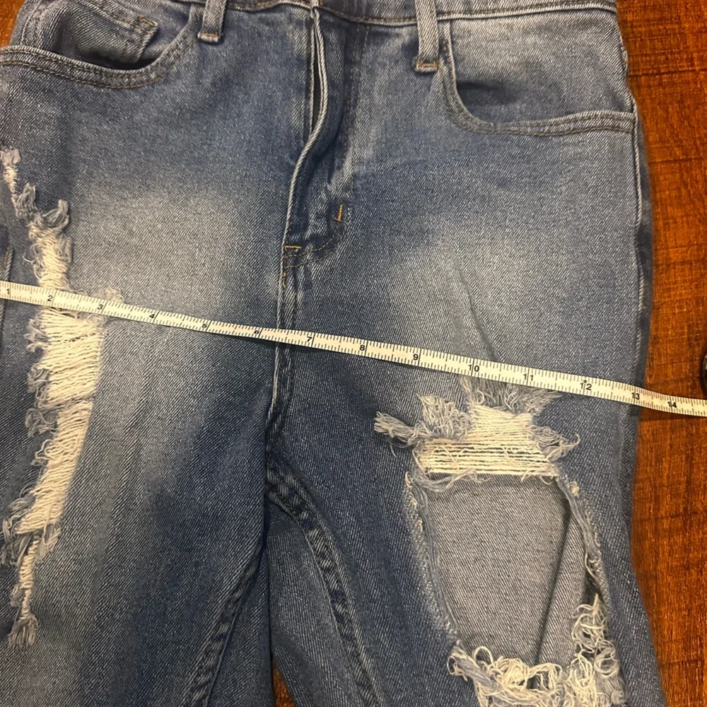 Distressed Blue Jeans